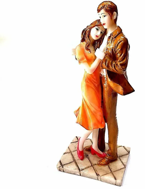 https://cdn-image.blitzshopdeck.in/ShopdeckCatalogue/tr:f-webp,w-600,fo-auto/64fd812e514fcc0012b9c253/media/Handicrafts Love Couple Statue 10-12 Inches, Brown_1694694604172_nqy19s2qokwb5sf.jpg__Decor4U